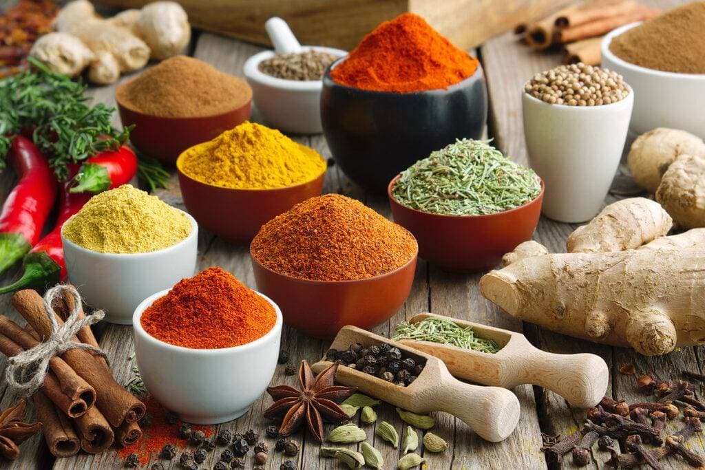 Various aromatic colorful spices and herbs. Ingredients for cooking. Ayurveda treatments.