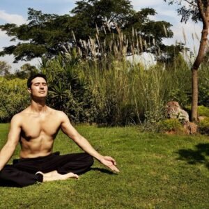 Reconnect with Nature A serene view of IVAC’s lush green surroundings, featuring tall trees, flowering plants, and peaceful pathways that offer a tranquil escape and encourage introspection.