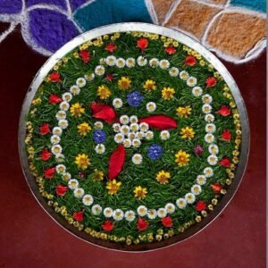 A vibrant floral arrangement displayed in a traditional pattern, symbolising harmony and balance at IVAC. The intricate design reflects the beauty of nature, embodying the essence of Ayurveda and the holistic approach to wellness, welcoming guests into a serene and healing environment.